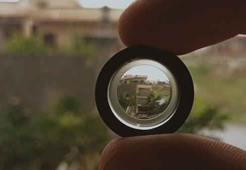 Artistic shot of landscape view through handheld lens outdoors.